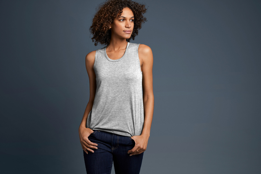 Premium AI Image  a woman wearing a gray tank top with a black